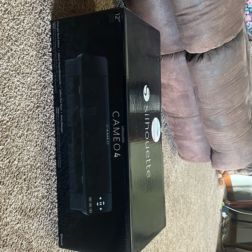 Silhouette cameo four still in the box never been used!!